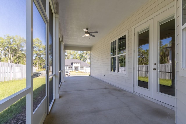 11828 NW 15th Rd, Gainesville, FL 32606 - unfurnished sunroom with french doors and a ceiling fan