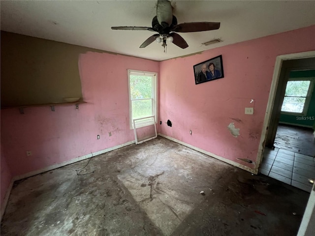 empty room featuring ceiling fan