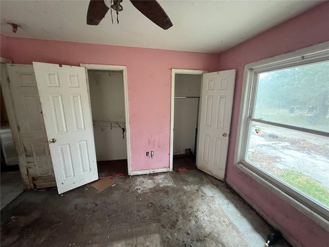 unfurnished bedroom featuring ceiling fan