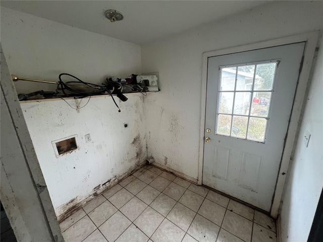 clothes washing area with washer hookup and hookup for an electric dryer