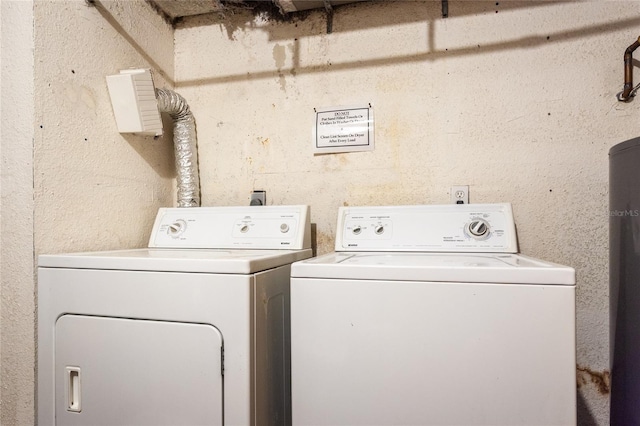 washroom featuring independent washer and dryer