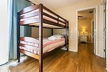 bedroom featuring dark hardwood / wood-style floors