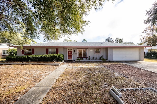 ranch-style house featuring a garage