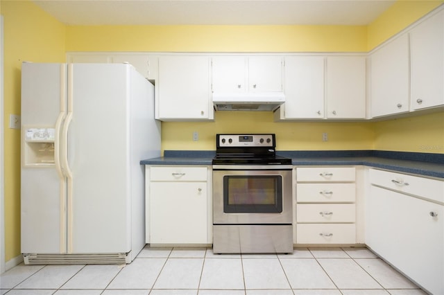 kitchen with light tile patterned floors, white cabinetry, white fridge with ice dispenser, and stainless steel range with electric cooktop