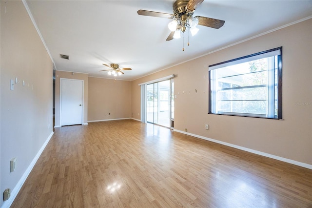 unfurnished room featuring light hardwood / wood-style flooring, ceiling fan, and ornamental molding