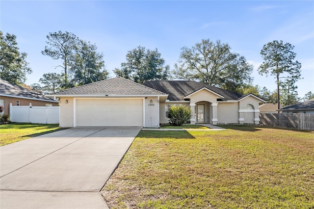 ranch-style house with a front yard and a garage