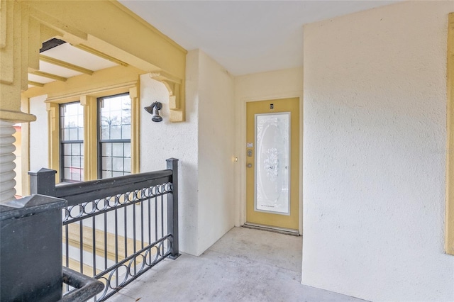 property entrance with a balcony