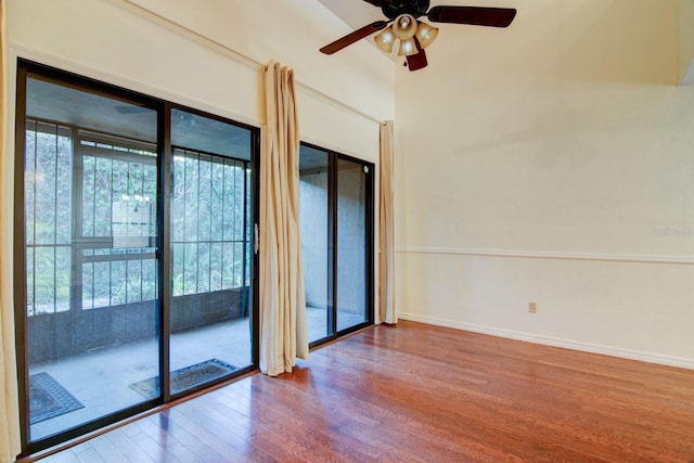 spare room featuring ceiling fan and wood-type flooring