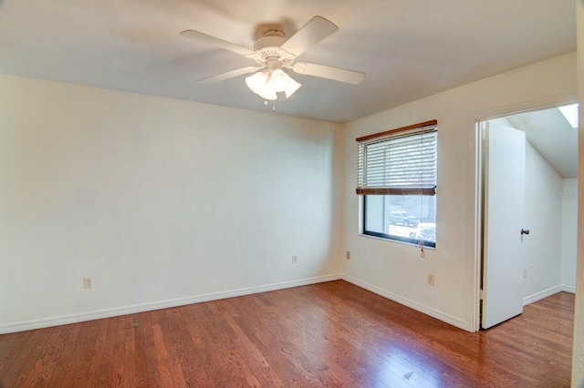 empty room featuring hardwood / wood-style floors and ceiling fan