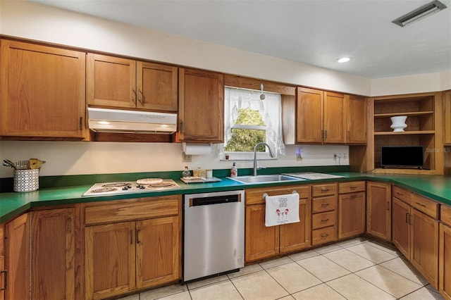 kitchen with dishwasher, white gas stovetop, sink, and light tile patterned floors