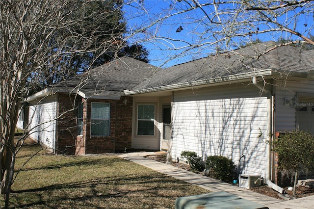 exterior space with a lawn