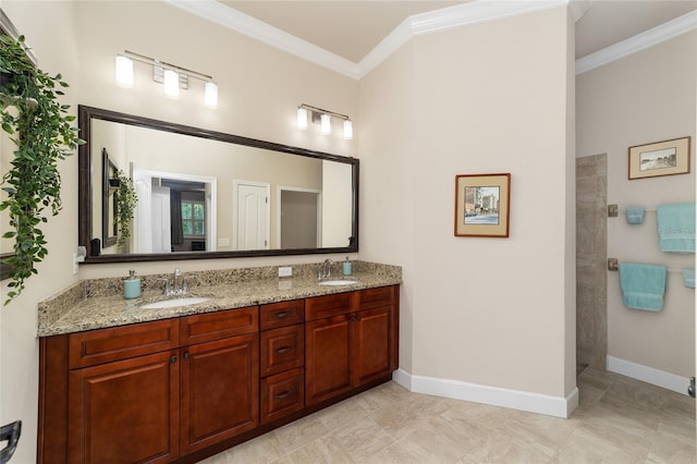 bathroom with ornamental molding, vanity, and walk in shower