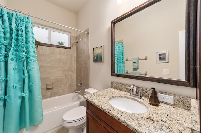 full bathroom featuring vanity, toilet, and shower / bath combo with shower curtain