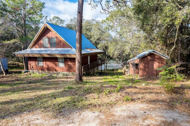 exterior space with a storage shed