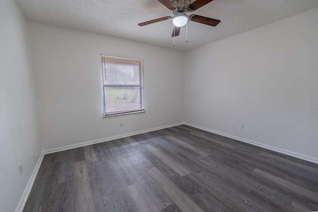 unfurnished room with ceiling fan, dark hardwood / wood-style flooring, and a textured ceiling