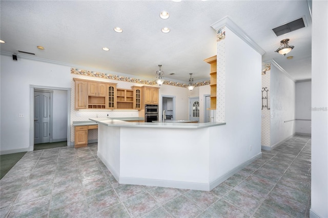 kitchen with light brown cabinets, ornamental molding, double oven, tasteful backsplash, and kitchen peninsula