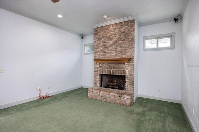 unfurnished living room with a brick fireplace, dark carpet, and ornamental molding