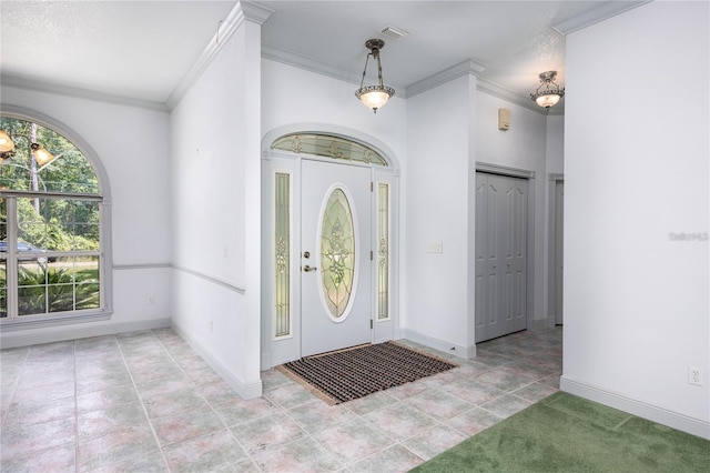 entryway with crown molding