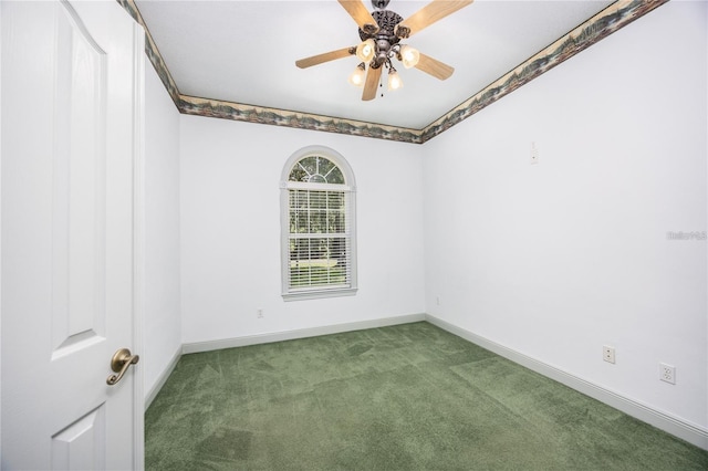 unfurnished room featuring carpet and ceiling fan