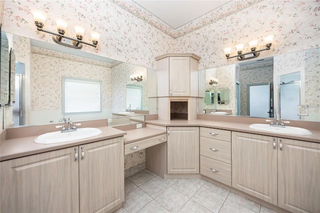 bathroom featuring tile patterned flooring and vanity