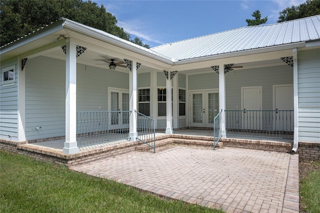 view of patio / terrace featuring covered porch, french doors, and ceiling fan