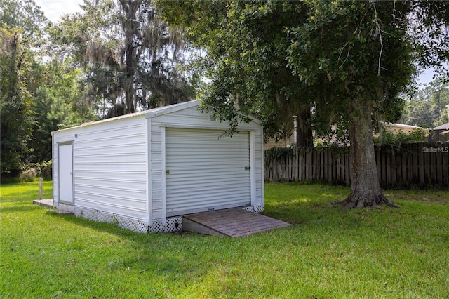 view of outdoor structure with a yard