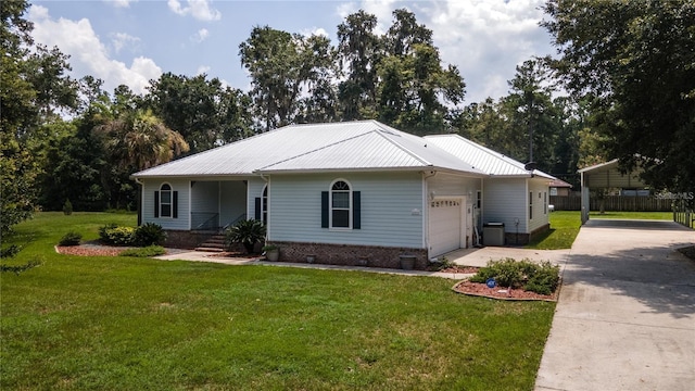 ranch-style house featuring a front lawn and a garage