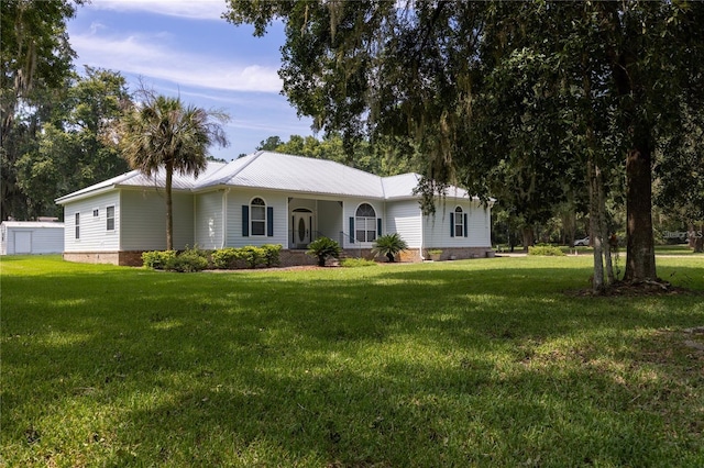 ranch-style home with a front lawn