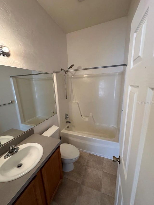 full bathroom with toilet, vanity, and shower / bathing tub combination