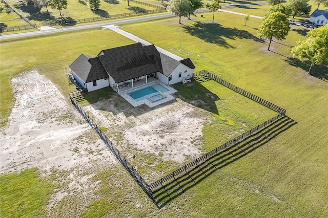 birds eye view of property featuring a rural view