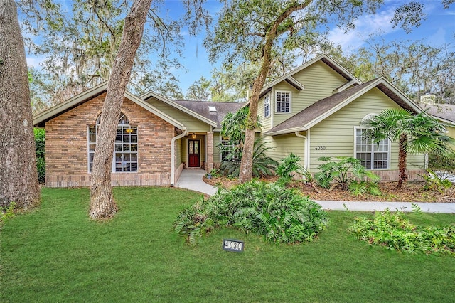 view of front of house with a front lawn