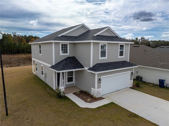 view of property featuring a garage, cooling unit, and a front lawn