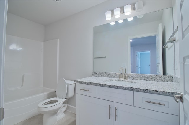 full bathroom featuring toilet, vanity, tile patterned flooring, and bathtub / shower combination