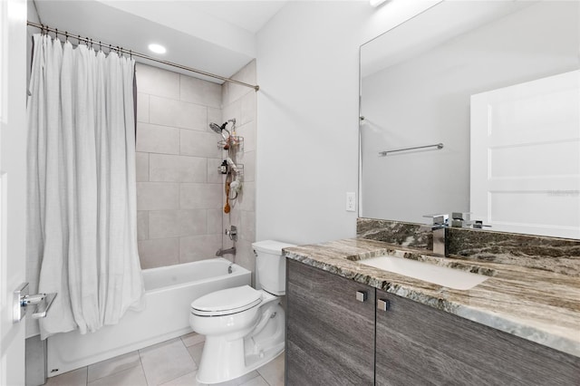 full bathroom with vanity, tile patterned flooring, shower / bathtub combination with curtain, and toilet