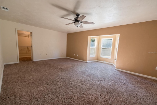 spare room with ceiling fan