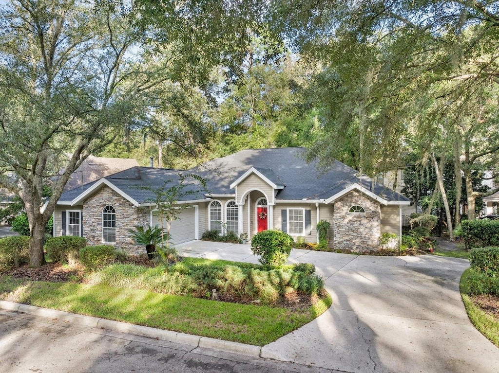 ranch-style home with a garage