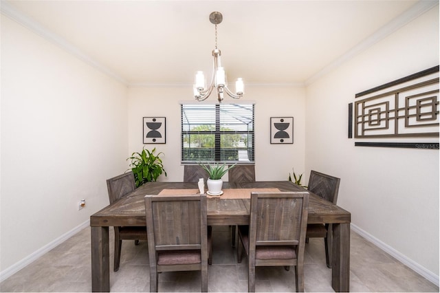 dining area featuring ornamental molding and a chandelier