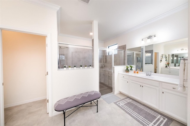 bathroom with tile patterned floors, a shower with door, crown molding, and vanity