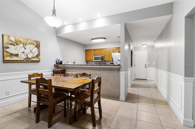 view of tiled dining space