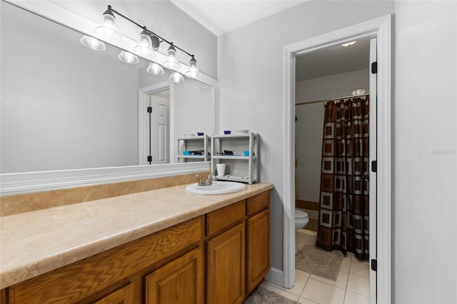 bathroom with tile patterned flooring, vanity, a shower with curtain, and toilet