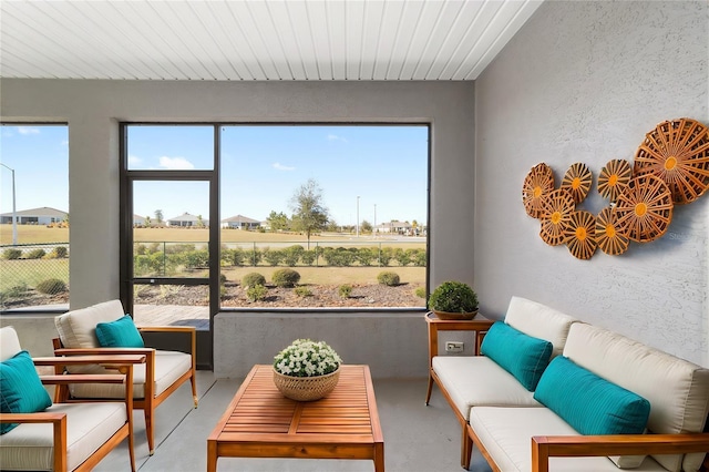 sunroom featuring a healthy amount of sunlight