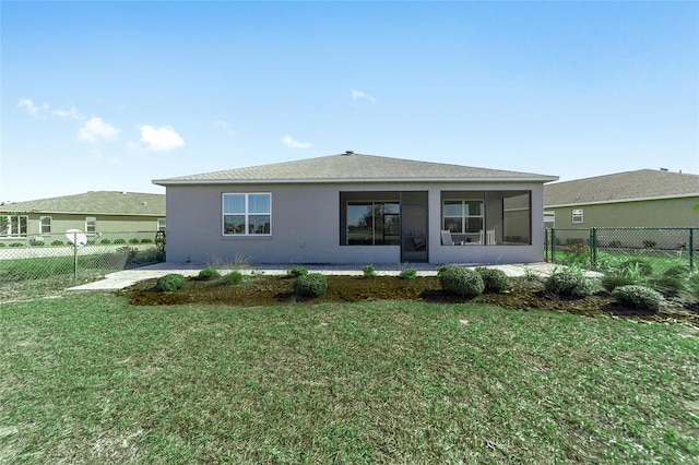8731 SW 76th Street Rd, Ocala, FL 34481 - rear view of property featuring a sunroom and stucco siding