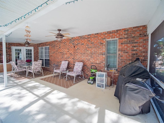 view of patio featuring ceiling fan and french doors