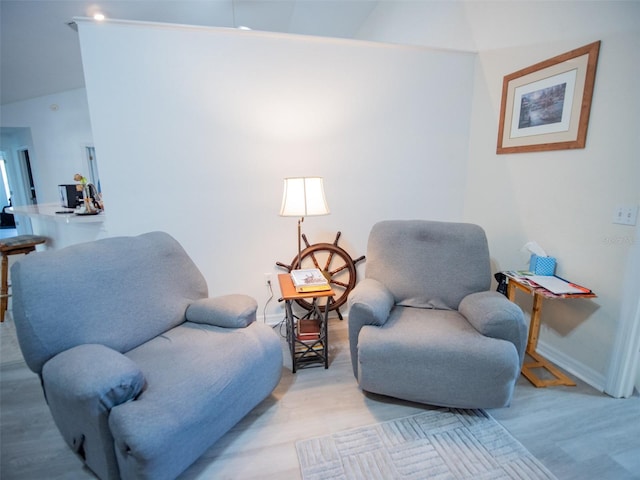 sitting room with light hardwood / wood-style floors