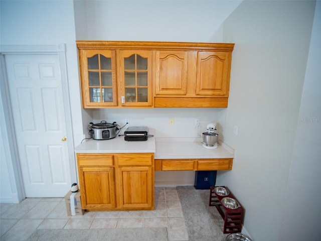 kitchen with light tile patterned floors