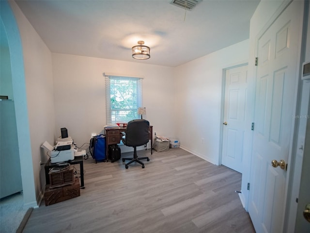 office area with light wood-type flooring