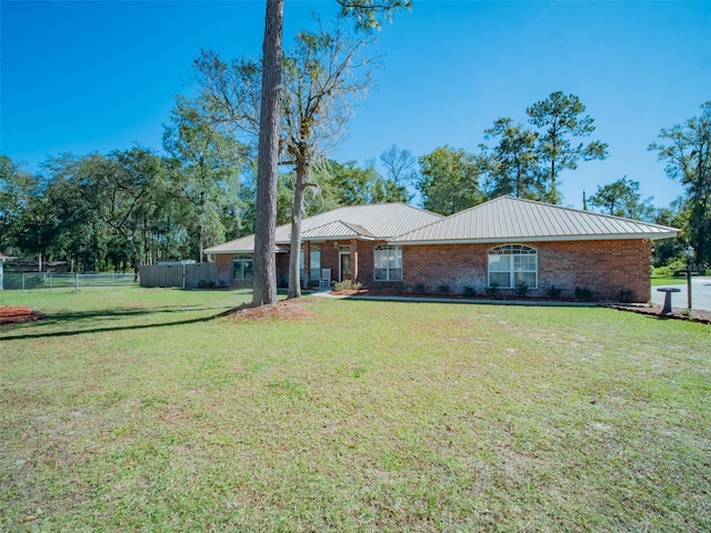 single story home with a front yard