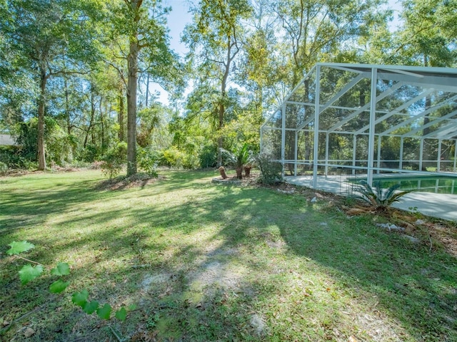 view of yard featuring a lanai