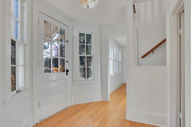 doorway to outside featuring light hardwood / wood-style flooring