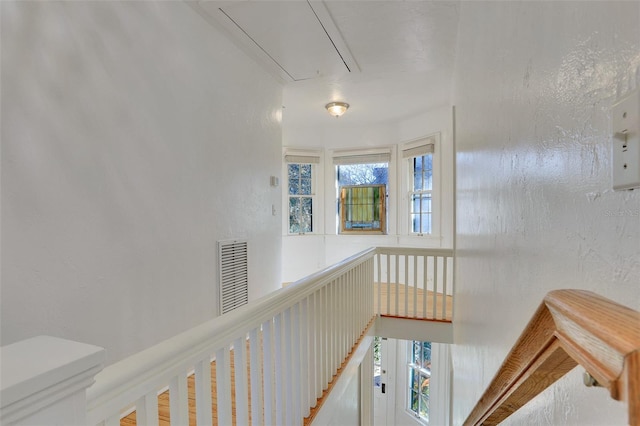 704 NE 4th St, Gainesville, FL 32601 - hallway featuring attic access